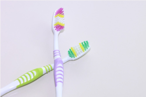 Pair of toothbrushes on a counter Family Dentist Woodbine